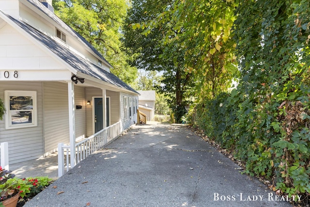 view of property exterior with a garage