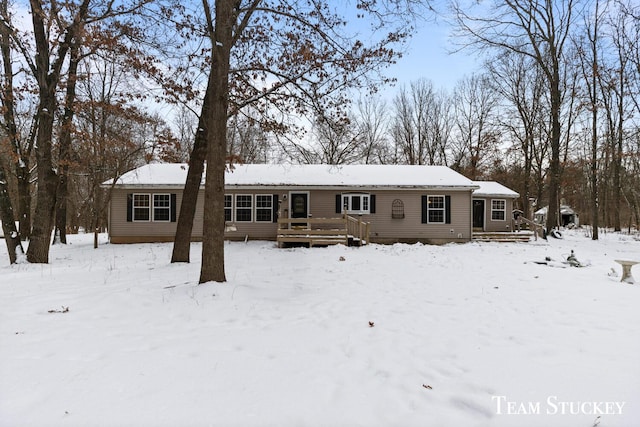 view of front of home with a deck