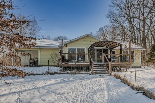 view of front of home with a wooden deck