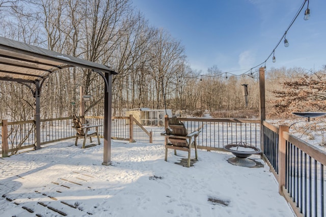 view of snow covered deck