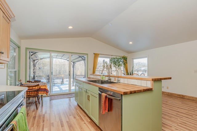 kitchen featuring sink, light hardwood / wood-style flooring, green cabinetry, wood counters, and stainless steel dishwasher