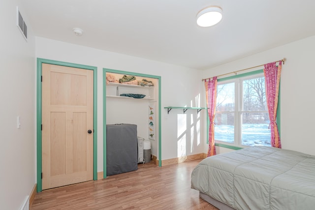 bedroom featuring light hardwood / wood-style floors