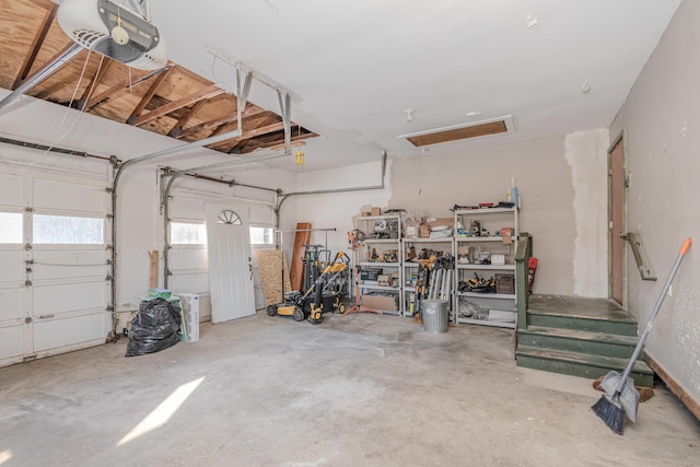 garage featuring a garage door opener