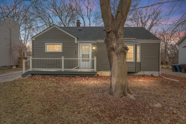 view of front facade featuring a wooden deck