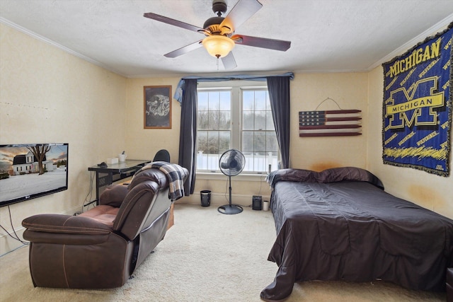 carpeted bedroom with a textured ceiling and ceiling fan