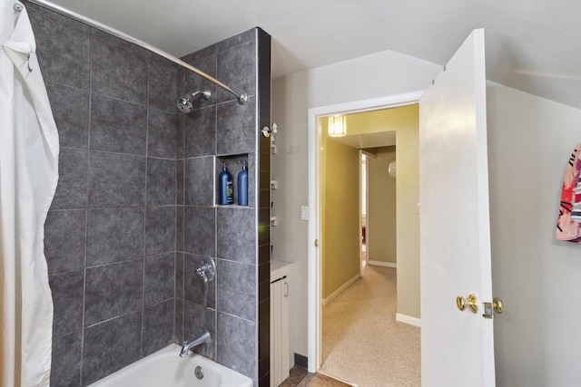 bathroom with shower / bath combination with curtain