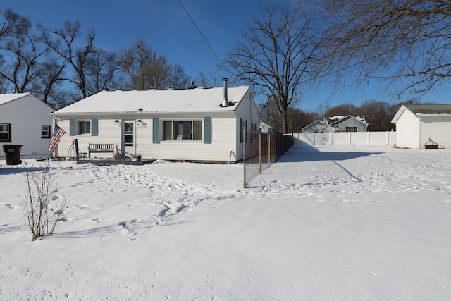 view of snow covered house