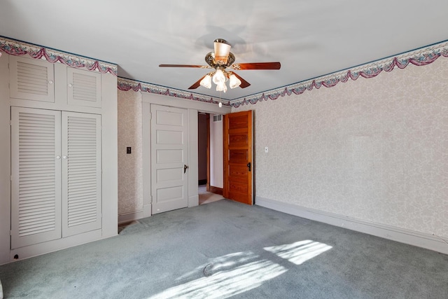 unfurnished bedroom with light carpet, a closet, and ceiling fan