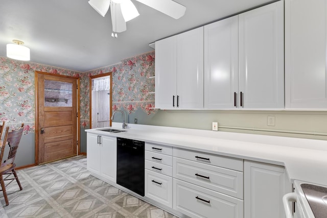 kitchen featuring white cabinetry, sink, and black dishwasher