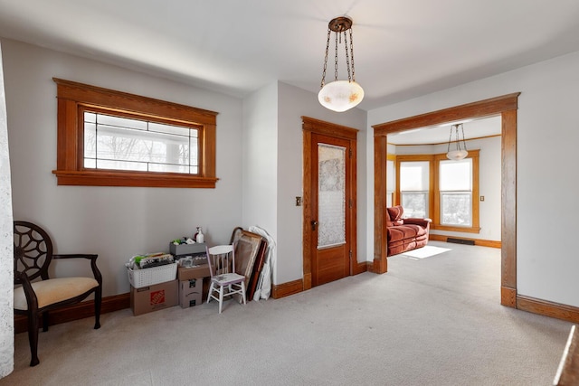 foyer with carpet