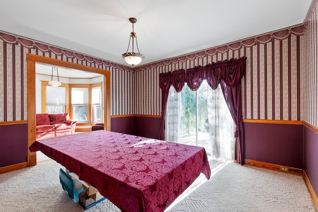 bedroom featuring light carpet