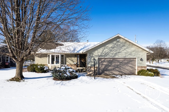 single story home with a garage