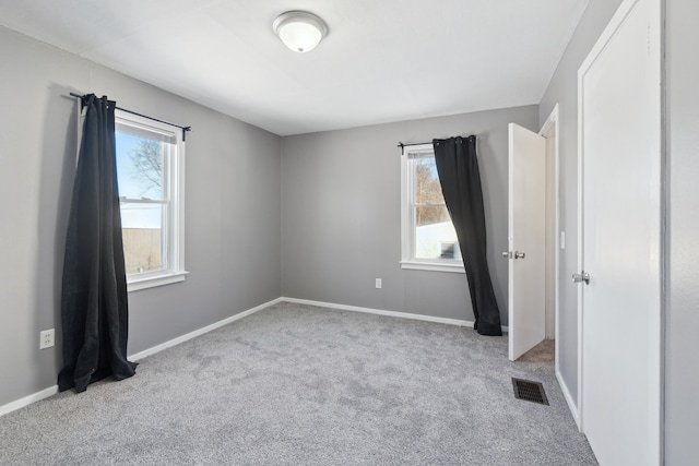 view of carpeted spare room