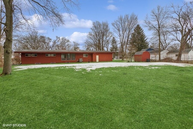 exterior space featuring a storage unit