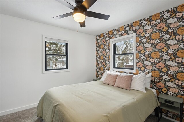 24112 N Shore Dr, Edwardsburg, MI 49112 - carpeted bedroom featuring baseboards, wallpapered walls, and a ceiling fan