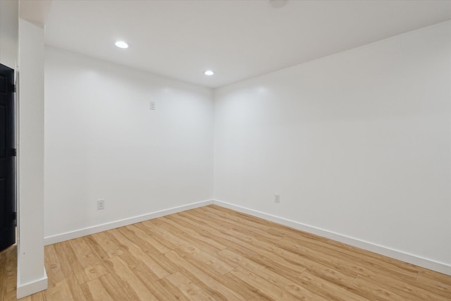 24112 N Shore Dr, Edwardsburg, MI 49112 - spare room with baseboards, light wood-style floors, and recessed lighting