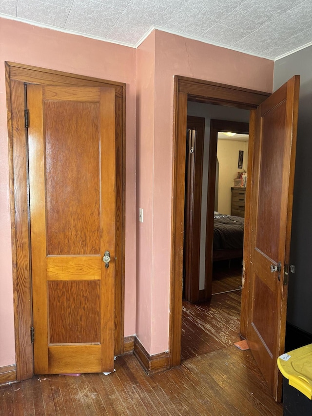 hallway featuring dark hardwood / wood-style floors