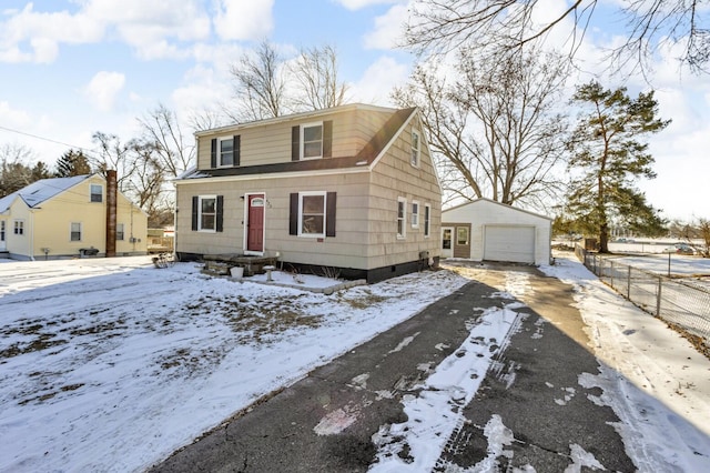 view of front of house featuring an outbuilding and a garage