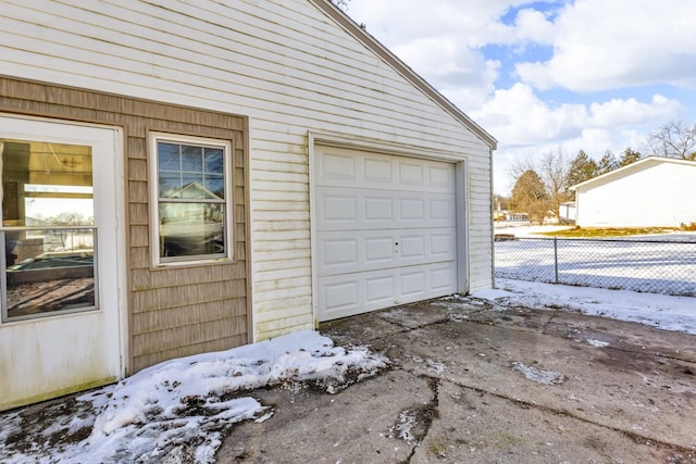 view of snow covered garage