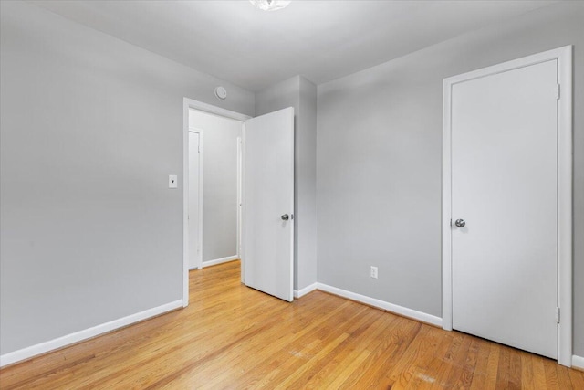 unfurnished bedroom featuring light hardwood / wood-style flooring