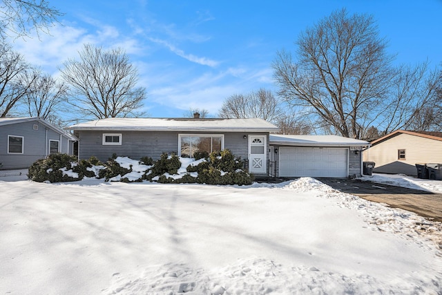 single story home with a garage