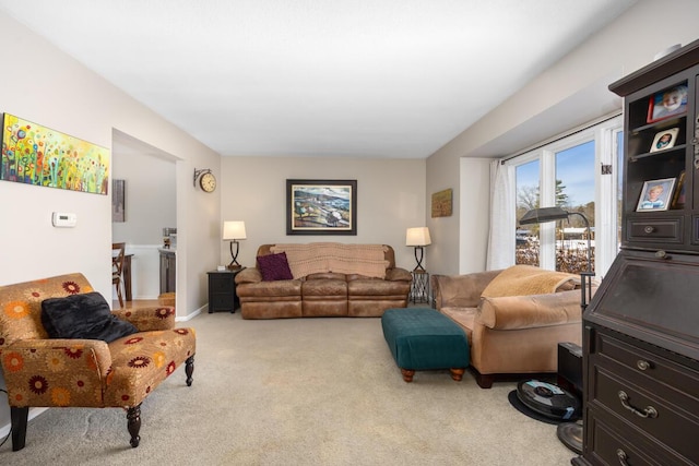 living room featuring light colored carpet