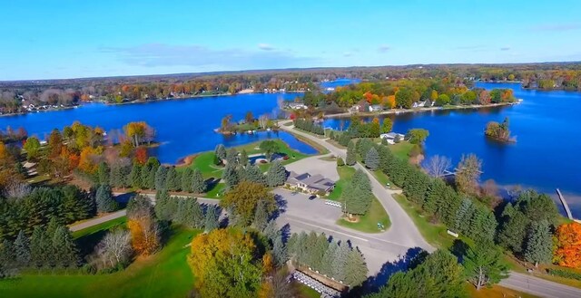 11300 Apache Wells Ct, Stanwood, MI 49346 - drone / aerial view of a nearby body of water