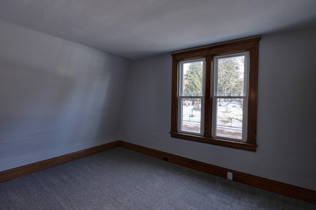 empty room with carpet flooring