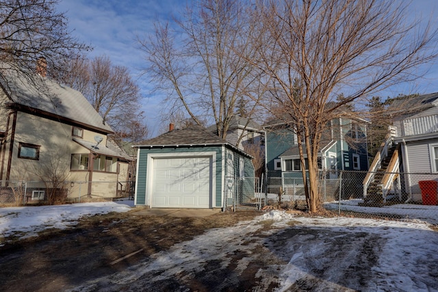 view of snow covered garage