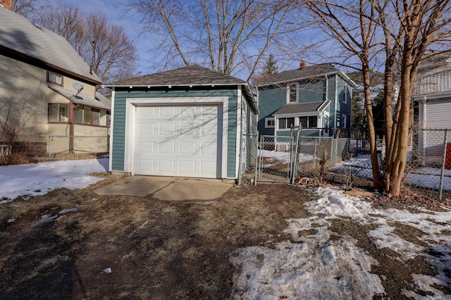 view of snow covered garage