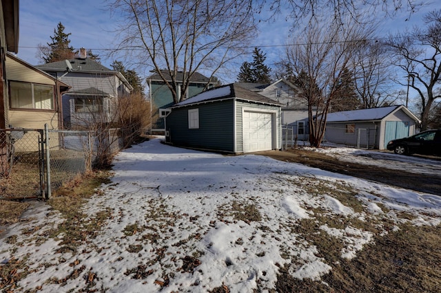 view of snow covered garage