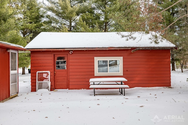 view of snow covered house