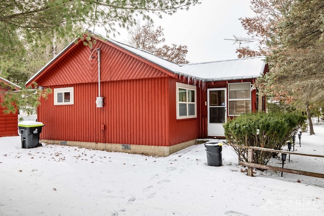 view of snow covered property