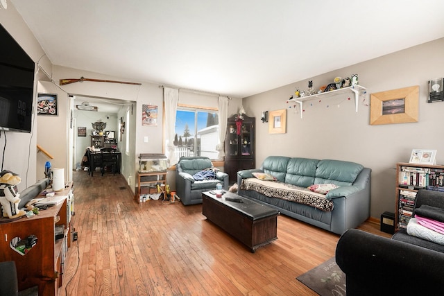 living room with light hardwood / wood-style floors