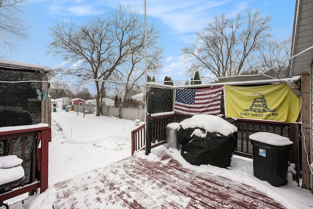 view of snow covered deck