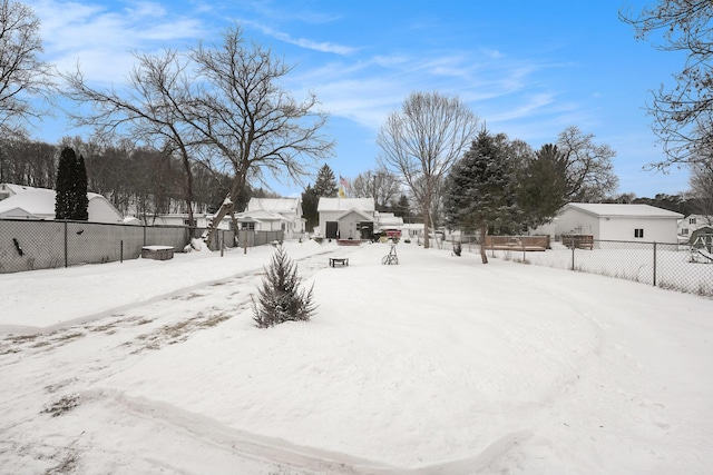 view of yard covered in snow