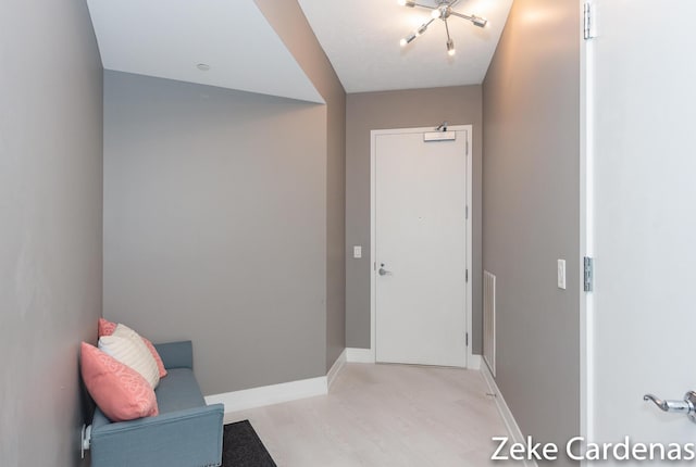 doorway to outside with light hardwood / wood-style floors