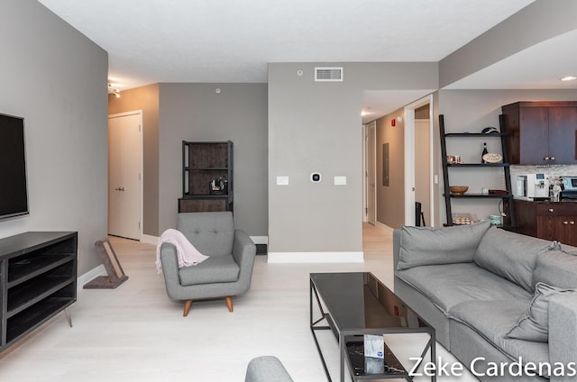 living room featuring light hardwood / wood-style flooring