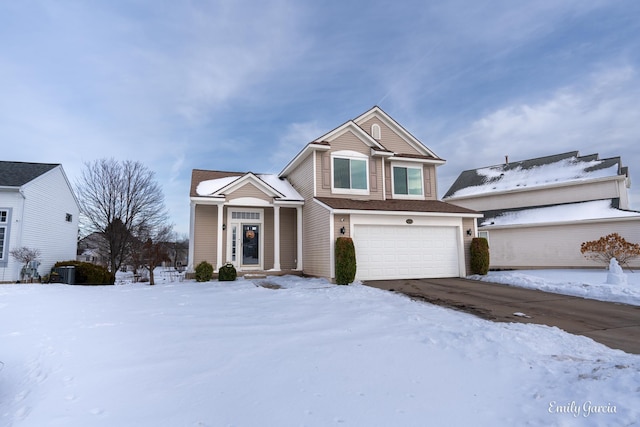 view of front of property featuring a garage