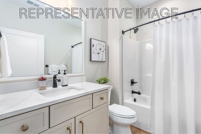 full bathroom featuring shower / bathtub combination with curtain, vanity, and toilet