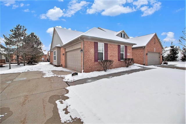 view of snow covered exterior featuring a garage