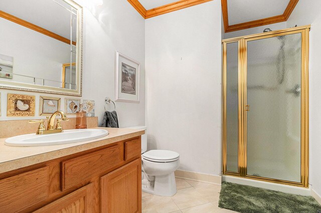 bathroom featuring crown molding, an enclosed shower, vanity, tile patterned floors, and toilet