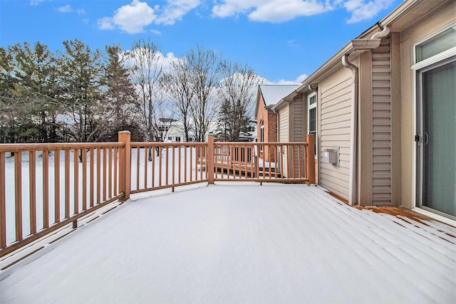 view of snow covered deck