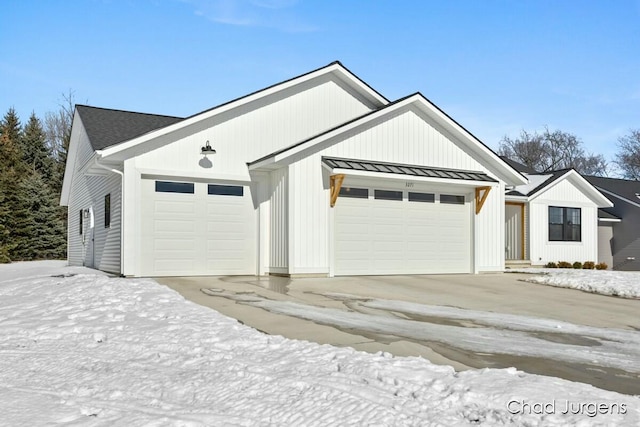 modern farmhouse style home with a garage