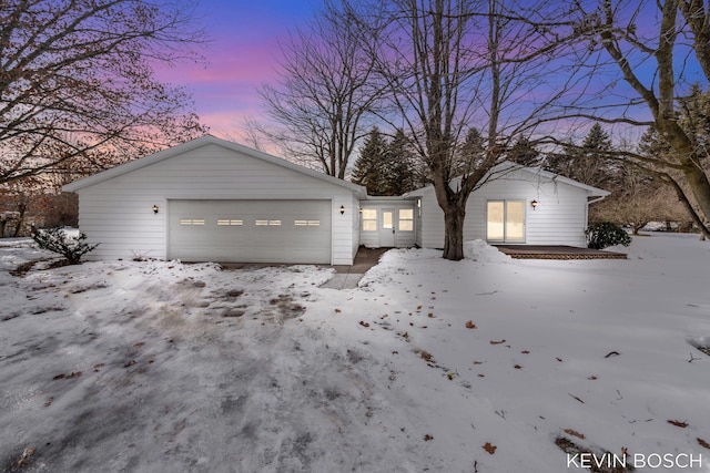 view of front of property featuring a garage