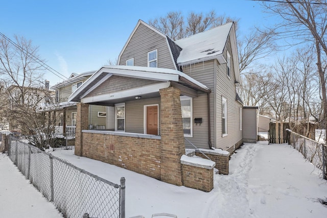 view of front of home featuring covered porch