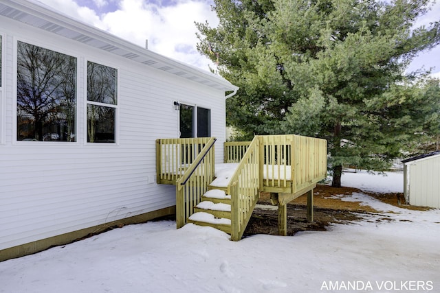 view of snow covered deck