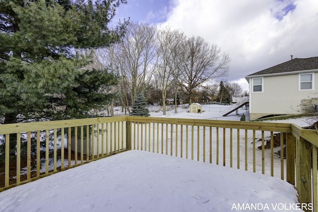 view of snow covered deck