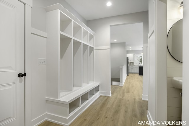 mudroom featuring light hardwood / wood-style flooring