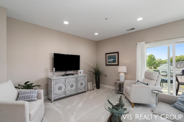 living room with light colored carpet